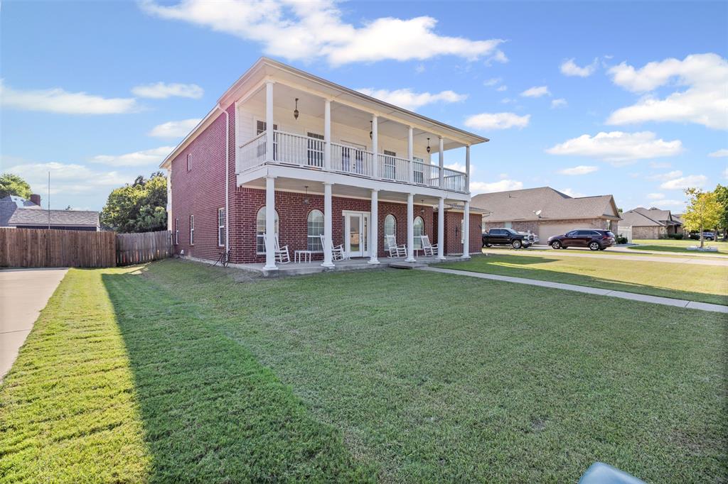 This spacious 5-bedroom, 4-bathroom, and home office offers room to spread out while featuring unique architectural touches that set it apart.

The first thing you’ll notice is the huge front balcony—a rare and eye-catching feature, perfect for morning coffee, evening relaxation, or simply enjoying the view. Step out back and you’ll find a second private balcony, overlooking the yard and creating the ideal spot for outdoor entertaining or quiet getaways.

Inside, the home boasts an open-concept layout filled with natural light, a functional kitchen with plenty of storage, and large living and dining areas designed for both daily living and hosting. The primary suite is a retreat of its own, while the additional bedrooms and multiple living spaces offer flexibility for family, guests, or a home office.

With 4 bathrooms, everyone enjoys convenience and comfort. The spacious backyard provides even more room for gatherings, BBQs, and playtime under the Texas sky.

Located in the heart of Ennis, you’ll be close to schools, shopping, dining, and have easy access for commuting.
