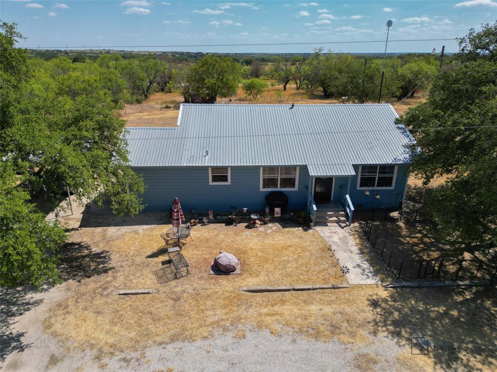 A LITTLE OVER 155 ACRES IT HAS A 3 BEDROOM 2 BATH HOUSE THAT HAS RECENTY BEEN REMODELED.  NEW LESS THAN A YEAR OLD AEROBIC SEPTIC SYSTEM. IT HAS ZEPHYR WATER. THERE IS 4 TANKS ON PROPERTY THAT HAS NEVER GONE DRY. IT HAS GOOD FENCES AND A SET OF WORKING PENS. THE PROPERTY IS ABOUT HALF COVERED WITH LARGE TREES. THERE IS LARGE FIELDS WITH GOOD GRASS. THERE IS ONE WATER WELL THAT CURRENTLY NOT IN USE. THERE IS COUNTY ROADS ON THREE SIDES OF THE PROPERTY WITH ELECTRICITY. THIS PROPERTY WOULD BE A GREAT INVESTMENT. IT COULD EASILY BE DIVIDED IN SMALLER TRACKS.THIS PLACE HAS A LOT OF OPTIONS WITH GREAT HUNTING. NEW TO GOOD FENCES. SET WORKING PENS.