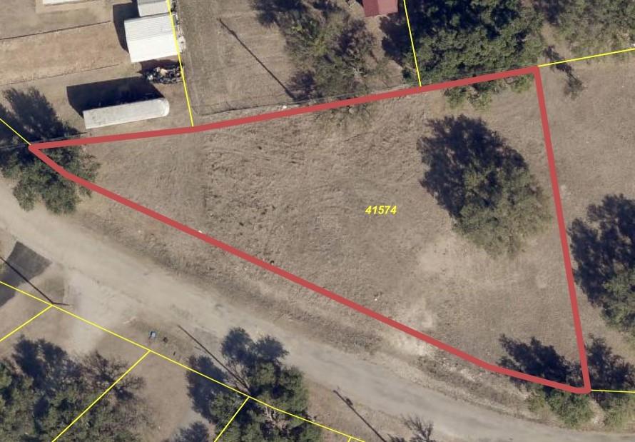 Great corner lot available in Harbor Point!  Located just blocks from the water, boat ramp, boat dock, and community community pool, this one is ready for your mobile home, manufactured home, or lake cabin retreat!  Whether you are looking for a place for fulltime living or a weekend getaway, the neighborhood  is a hot spot at Lake Brownwood with welcoming neighbors and all of the amenities!