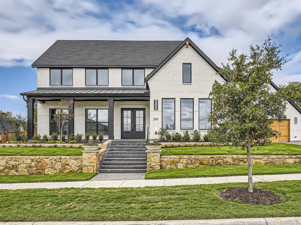 This gorgeous 5 bedroom painted white new construction home sits high on a corner lot overlooking trees to side and rear, backs to a small greenbelt and very private setting.  This home has 3 bedrooms and in suite baths downstairs, along with media room, across from serving bar.  It has a flex room, perfect for a home gym, right off master bath, with its own covered patio siding to trees.  Don't miss this rare opportunity to live on .5 acre lot in Windsong Ranch Custom estate section, The Pinnacle.