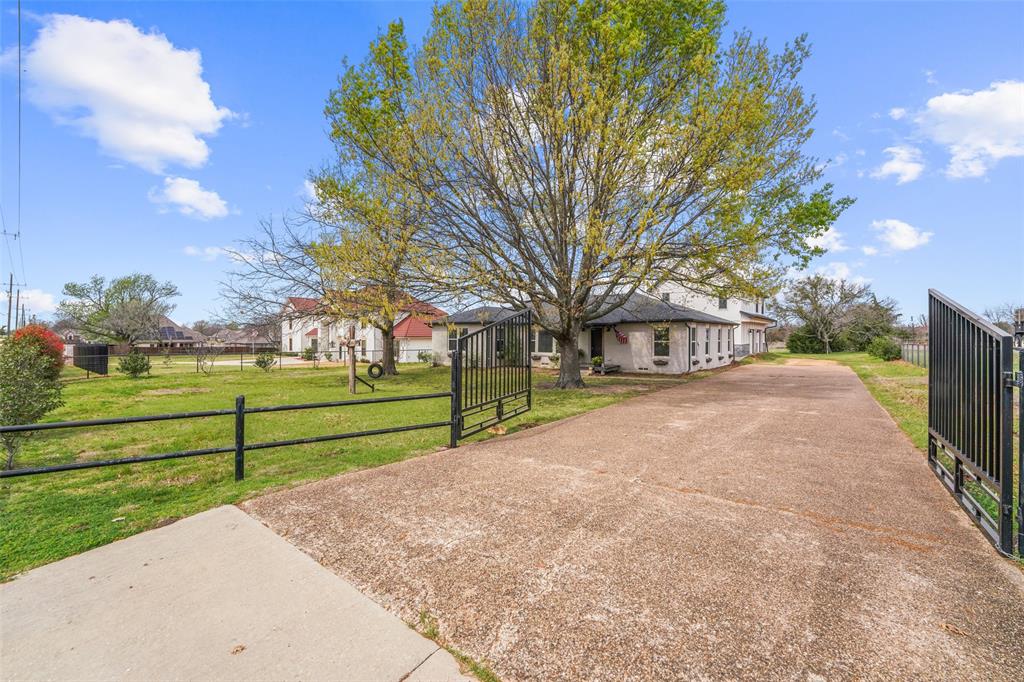 Beautifully updated 4-bedroom, 3-bath home situated on nearly 3 acres in Rockwall ISD. This move-in ready property offers the perfect blend of country living and city convenience, located just minutes from I-30 and the shops and dining of Downtown Rockwall. The home features spacious living areas, an open kitchen with island and granite counters, decorative lighting, and modern finishes throughout.

Enjoy peaceful outdoor living with mature trees, a large backyard, and a private pond ideal for fishing or relaxing. The property also offers perimeter fencing, RV-boat parking, and plenty of space for additional parking or future improvements.


With approximately 2,780 square feet of living space, this home provides comfortable living on an expansive lot while still being close to schools, shopping, and entertainment. A rare opportunity to own acreage with city conveniences in Rockwall!
