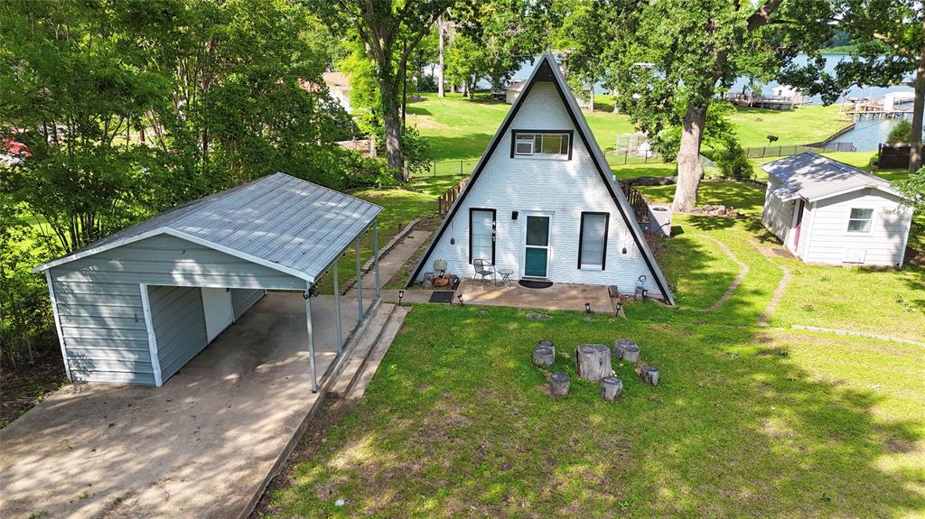 Seller Offering $5000 toward buyer's closing cost plus Home Warraty! Charming A-Frame retreat with seasonal views of beautiful Lake Tawakoni! This cozy home is full of character and natural light, featuring soaring ceilings and stunning glass French doors with sidelights that bring the outdoors in. Enjoy your morning coffee or evening sunsets from the large porch overlooking the lake view and peaceful surroundings. The property also includes access to a carport, storage shed, and a separate utility room with washer and dryer hookups.Conveniently located near East Tawakoni City Park and the Two-Mile Bridge West Public Boat Ramp, making it easy to enjoy fishing, boating, and lake activities year-round. Property does not have direct lake access, only a lake view.
Buyer's agent to verify all information is accurate. The owner and listing agent is not held liable for any inaccurate info. Bring all offers — no blind offers. Please submit written offer with proof of funds or pre-approval letter from lender.