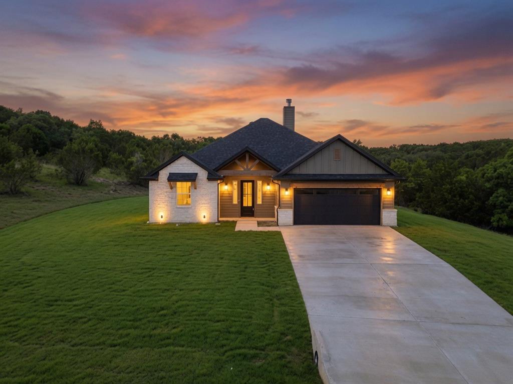 Welcome to your dream home carefully crafted by Carrera Homes. Situated on a spacious lot of just over 2 acres, this modern farmhouse radiates charm and sophistication, blending rustic warmth with sleek, contemporary design. The home offers exceptional privacy and versatility on its expansive grounds and is located near a cul-de-sac for added peacefulness.

As you step inside, you’ll be greeted by an open floor plan that seamlessly connects the living and dining areas, making it ideal for gatherings and everyday living. A wood-burning fireplace anchors the living area, flanked by an elegant arched built-in bookshelf for stylish storage. The elegant vaulted ceilings elevate the ambiance in both the living room and master suite, while an oversized window in the kitchen bathes the space in natural light and frames stunning views of your expansive backyard. Laminate flooring flows throughout, accented by beautifully designed decorative tile in the bathrooms and laundry room for a touch of playful elegance.

The split-bedroom layout places the generous master suite—complete with an en-suite bath featuring a large walk-in shower, double vanity, and oversized walk-in closet—on the opposite side of the home from the guest rooms and bath. This home features custom cabinetry and is equipped with foam insulation throughout, significantly enhancing energy efficiency and helping to keep your utility bills low. The functional mudroom at the entry is perfect for keeping your space organized.

Beyond the walls of this exquisite home lies a vibrant community filled with amenities to enhance your lifestyle. Enjoy sunny afternoons at the community pool, host gatherings at the clubhouse, or let the kids explore the playground. For outdoor enthusiasts, the community offers scenic lakes and jogging paths. Additionally, RV parking is available for those who enjoy weekend adventures. 

Don’t miss your chance to make this your forever home! Schedule a showing today!