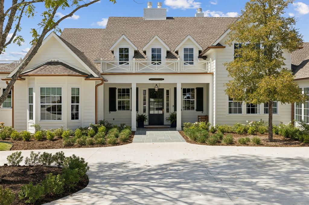 Inspired by the timeless elegance of a New England Cape Cod estate, this custom-designed masterpiece has been thoughtfully curated to capture the essence of refined luxury, exceptional craftsmanship, and enduring design.
Step inside to discover a home that’s both breathtaking and functional. At its heart lies a marble-topped kitchen island, illuminated by a wall of windows overlooking mature trees and impeccable landscaping. The kitchen showcases professional grade appliances- an ILVE 8-burner gas range, GE Monogram paneled refrigerator and freezer, dual dishwasher drawers, and abundant custom cabinetry.The prep kitchen enhances the space with additional storage, a second dishwasher, wall oven, and instant hot and cold filtered water system.
The open layout flows effortlessly into the breakfast and sunroom, where PA bluestone tile and Sierra Pacific windows flood the space with natural light. The main laundry room feels like a page from BHG magazine,featuring elegant cabinetry,a Kohler Farmstead sink, shiplap walls, and beamed ceiling.
A home truly defined by its extensive custom millwork, designed and crafted to elevate every room. Solid pocket doors, shaker wood shutters,built-in  plate rack, and detailed trim around every window and door showcase exceptional artistry. Spa-inspired baths w marble and soapstone surfaces bring timeless beauty and durability. Game room with wet bar and golf simulator, a private office, and four fireplaces finish off the space.
Outside, the property transforms into an entertainer’s paradise where professional landscaping frames multiple patios finished in PA bluestone, lush turf, retractable screens, copper gas lanterns, and a versatile pickleball court w removable steel post net.Additional highlights include an attached garden shed ,porte cochere with brick walkway, and, last but not least, a full-house 26W generator.
This is not just a home it's a rare opportunity to own a residence that is as functional as it is breathtaking.