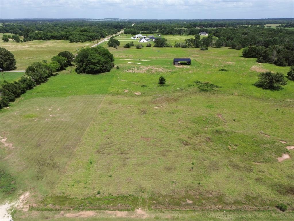 Cleared and ready for your future homesite, this 1.26-acre tract in Van Zandt County offers level ground, paved road access, and a flexible build opportunity outside city limits. With approximately 132 feet of road frontage along County Road 2413, the property provides an easy setup for new construction while still offering space and privacy in a rural setting. The land is flat, open, and ready for development, making it a strong fit for builders or buyers looking to create a custom home in the country. Utilities include access to a Rural Water District, electricity available at the road, and septic will be needed. Located in the county with site-built homes only, the property has no minimum square footage requirement and no required timeframe to build. Conveniently positioned for access to surrounding East Texas communities while maintaining a quieter rural feel, this tract offers a clean slate for your next build opportunity.