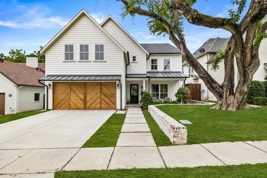 OFFER DEADLINE MONDAY MAY 9 - noon. This charming modern farmhouse in Lakewood Hills is straight out of a magazine! (yes D Home, amongst others) Walking distance to shopping, dining & White Rock Lake. Easy commute to Downtown means more time to enjoy the spectacular views of the swimming pool & Lakewood golf course. Exterior includes refreshing pool & breezy front & back porches. The interior includes hardwoods throughout, an open layout, both natural light & stylish fixtures, neutral decor, beamed ceilings, & fireplaces in the living room & back patio. Roomy, stylish kitchen charms with natural light, premium appliances, two ovens, & marvelous quartz counters. The peaceful master bedroom includes a foyer entrance, a walk-in closet, sitting space, & private bath with tub and step-in shower AND a balcony overlooking the pool.Master & Three bedrooms upstairs while downstairs is the 5th bedroom w murphy bed & ensuite bath Attached two-car garage. Don't let this be the one that got away.