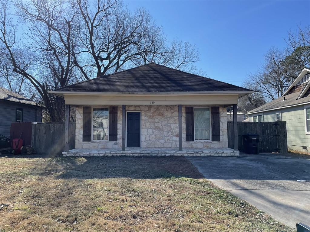 Cozy and charming two-bedroom, one-bath home nestled in the heart of Denison! Located on a quiet neighborhood street, this move-in-ready property offers comfort, convenience, and excellent investment potential, making it a great option as a primary residence or rental property. Relax and unwind on the beautiful Texas-sized covered front porch, the perfect spot to enjoy peaceful evenings with family and friends. Inside, luxury vinyl plank flooring flows throughout most of the home, including the spacious living room that opens seamlessly to the kitchen, creating a warm and welcoming atmosphere. The kitchen features a large breakfast bar ideal for morning coffee and conversation, modern appliances, an electric range, built-in microwave, and ample cabinet space. An oversized utility and laundry room provides abundant storage and everyday functionality. Both bedrooms are generously sized and share a full bath designed for comfort and convenience. Step outside to a large grassy backyard with plenty of room for entertaining, pets, play, or simply relaxing outdoors. Conveniently located just minutes from Downtown Denison, shopping, dining, entertainment, and major highways, this home combines small-town charm with everyday convenience. Whether you're searching for your next home or a turnkey investment opportunity, this property is full of character and potential.