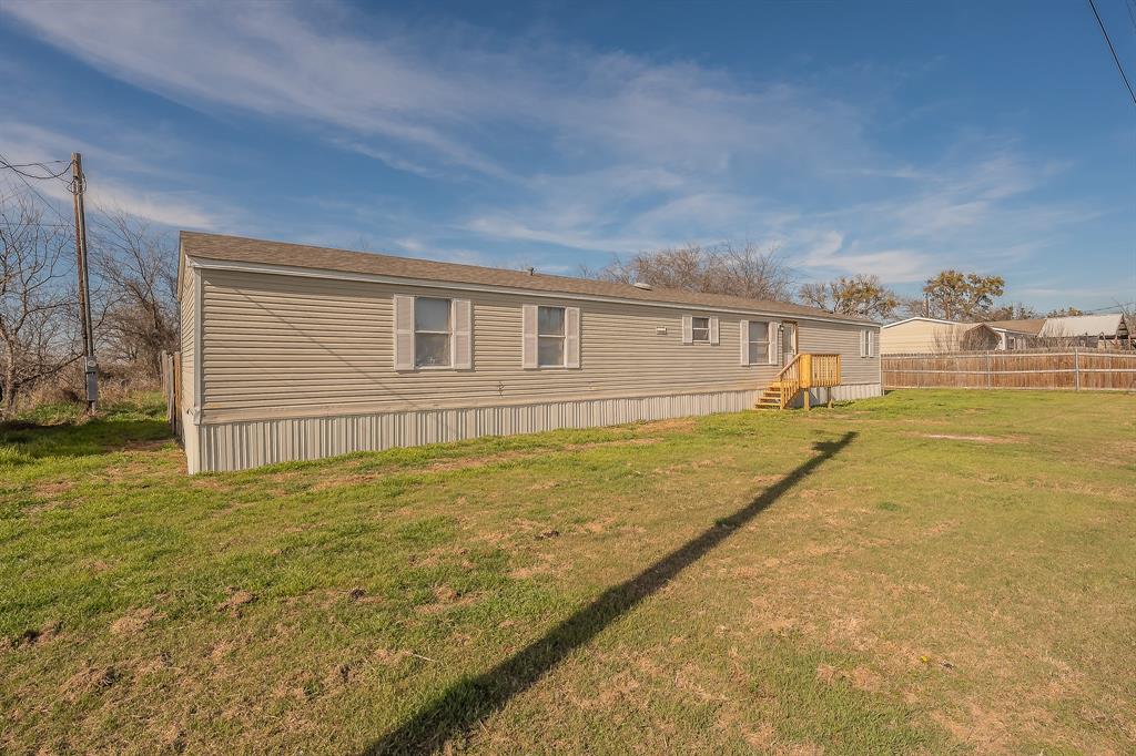 Opportunity awaits at 912 Skylark Drive in Granbury, walking distance to Lake Granbury! This property features an existing mobile home situated on a spacious lot, making it ideal for investors, renovators, or buyers looking for an affordable place to call home. Whether you choose to update the current mobile home, use it as an investment property, or explore future building opportunities, the possibilities are endless.

The lot offers plenty of space and flexibility, providing value beyond the existing structure. Conveniently located near shopping, dining, entertainment, and the amenities that make Granbury such a desirable place to live, this property is full of potential.

Bring your vision and make this property your own. Whether you're searching for land, an investment opportunity, or a place to start your next chapter
