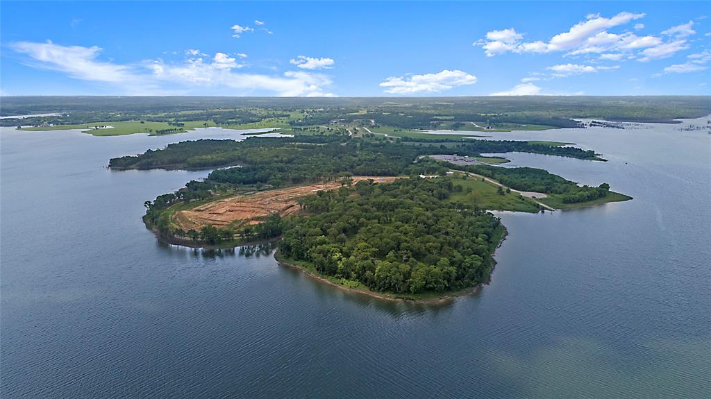 The Peninsula at Bois D’Arc Lake
An Unmatched Investment in Waterfront Luxury and Visionary Development
Positioned on the edge of Texas' first major man-made lake in over half a century, The Peninsula at Bois D’Arc Lake represents a generational investment opportunity. Encompassing 100 prime acres along 26 square miles of newly created shoreline, this exclusive waterfront property is strategically located just 90 minutes from Dallas and 70 minutes from McKinney, offering both seclusion and accessibility for future residents and guests.
Meticulously planned and platted with design inspirations drawn from renowned communities like Rosemary Beach (30A) and Carlton Landing, this development opportunity was envisioned as a boutique coastal-style village—crafted for high-end residential, mixed-use, or hospitality applications.
* Development-Ready:
    * Completed surveys and utility engineering
    * Master planning included with full-price offer
* Natural & Recreational Appeal:
    * Lake averages 22 ft in depth, reaching up to 70 ft
    * Ideal for boating, fishing, skiing, and year-round recreation
* Exceptional Market Positioning:
    * Located in high-growth Fannin County
    * Among the few large-scale, waterfront properties on a brand-new Texas lake
As demand for luxury lakefront living continues to rise across the region, The Peninsula offers an unmatched opportunity to shape a legacy destination—from private estate retreats to a thoughtfully integrated community development. With infrastructure planning complete and the canvas set, this offering stands ready for a visionary investor or developer to bring the next iconic lakefront destination to life.