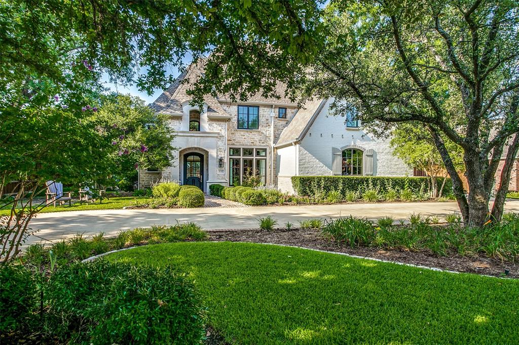 Extensively remodeled in 2020-2021 by John Young, this home has it all! Refinished hardwoods throughout, high ceilings, Pella windows and doors throughout. Completely new kitchen with beautiful cabinetry and top-of-the-line appliances including Subzero refrigeration, a Wolf induction cooktop, additional refrigeration drawers, large center island and wet bar. Lounge with bar and private patio, living room with fireplace and French doors that makes a great study, Primary suite downstairs with stunning bathroom, five additional bedrooms on the second level and large game room. Four wine and beverage stations located in the primary bedroom, lounge and upstairs, two utility rooms. Pool, spa, Mohave turf, outdoor grill. Three car garage plus circular driveway.
