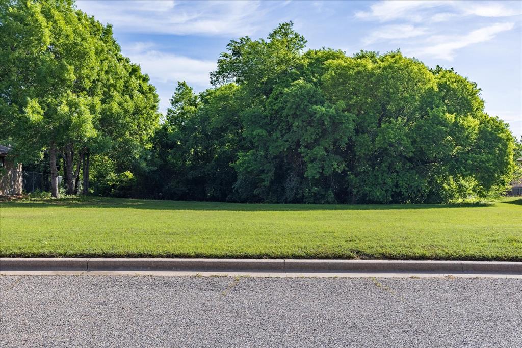 Tucked into the established River North II Addition in Stephenville, this .34 acre lot is one of those finds that’s hard to come by. Mature trees line the property, offering added privacy and a beautiful, wooded backdrop. City water and sewer are available at the street for future connection. At nearly 15,000 square feet, there’s plenty of room to design something that truly fits. The adjacent home at 515 Spring Meadow (MLS #21306920) is also available, creating a unique opportunity for buyers interested in additional space, a multigenerational setup, or future investment potential.