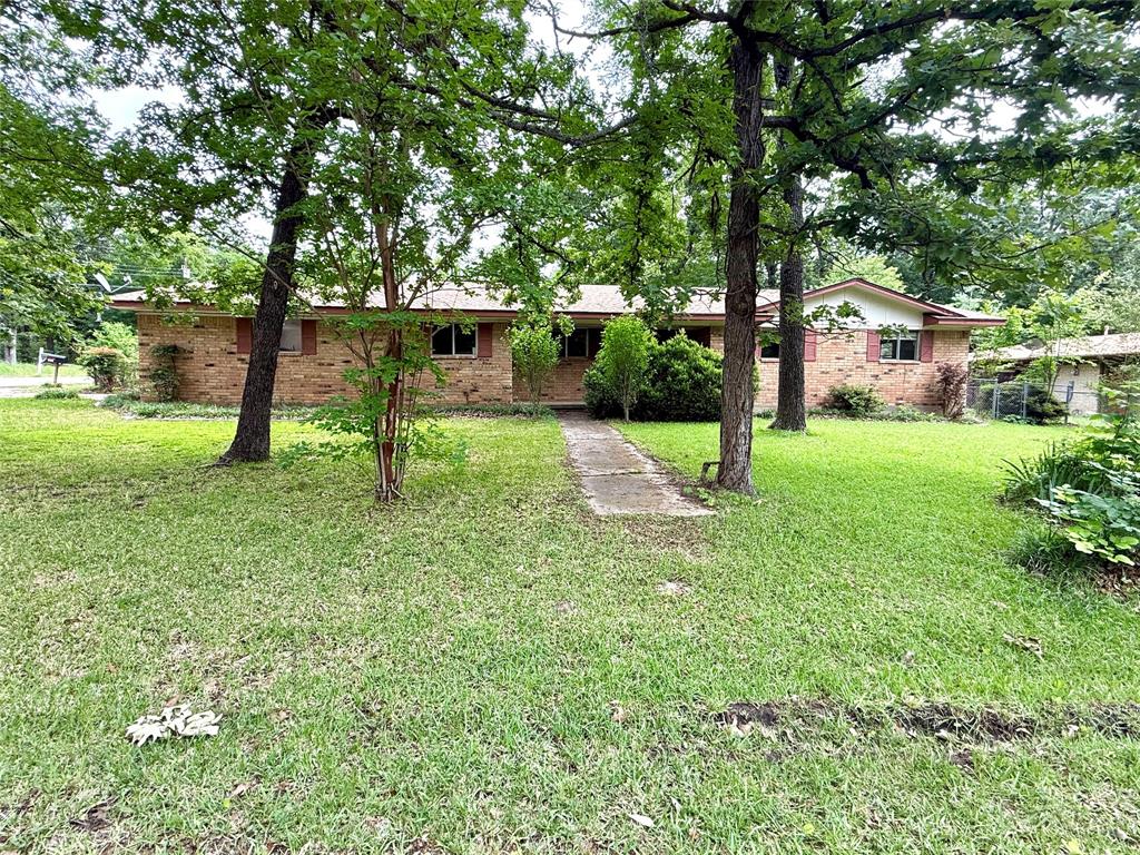 Come add your personal touch to this 3 bed 2 bath home in town close to Canton schools.  This home is full of potential! Sits on a corner lot with wonderful shades trees in front and back.  Breakfast area off of kitchen and room at the bar for seating. Full laundry room in house with additional entrance from carport for those hard working days.  Come check this one out!