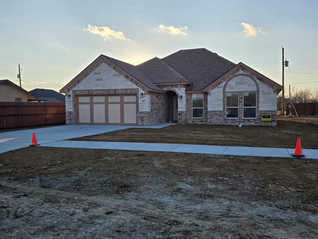 Beautiful new construction custom home featuring an all brick and stone exterior, 3 bedrooms, 2 baths, and approx. 1,590 sq ft in South Fort Worth. Highlights include an open-concept layout, stainless steel appliances, refrigerator included. Ceramic tile, luxury wood flooring, and a spacious 2-car garage. Full sod front and back.  The primary suite offers a separate walk-in shower and generous walk-in closets. Conveniently located near I-35W, I-20, and I-820 with quick access to shopping, dining, and entertainment at La Gran Plaza and nearby retail centers. Modern finishes, custom trim throughout and move-in ready. This home blends style and functionality—perfect for families, first-time buyers, or anyone seeking a fresh start in a growing community. You will enjoy a secluded country feel inside the city.
Buyer or agent to verify all info.