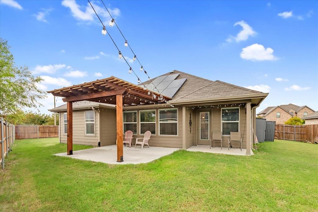 Price Adjustment on Large Corner Lot! Welcome to 1200 Queens Brook Lane, a 2021-built home offering 3 bedrooms, 2 baths, and 1,730 sq. ft. of modern living. This beautiful open floorplan features luxury vinyl plank flooring, abundant natural light, and an open-concept kitchen with stainless steel appliances, a large island with seating, a walk-in pantry and laundry room. The split primary suite is privately located away from secondary bedrooms and includes vaulted ceilings, dual sinks, a soaking tub, and a spacious walk-in closet. Smart home features include app-controlled lighting, security, and a programmable thermostat. Enjoy outdoor living with a beautiful, recently-added covered patio and oversized backyard. Enjoy lower electric bills and long term savings with energy-efficient solar panels. Situated on a desirable corner lot with great curb appeal and convenient access to shopping, dining, and major commuter routes. Move in ready and priced to sell! Ask me how to receive a lender credit up to $6,000 or 1% off your interest rate for the 1st year. Schedule a tour today!