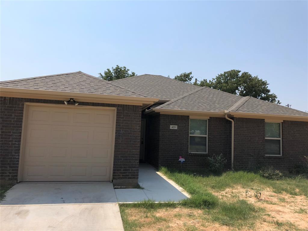AVAILABLE JANUARY 1ST 2024.....2019 Brick house on a corner lot in Azle, home has 3 bedrooms and 2 bathrooms with a one car garage attached. The home has stained concrete floors, granite countertops, custom cabinets.