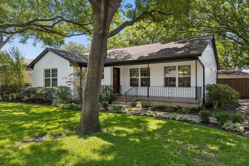 Fully renovated and updated with style, this Old East Dallas home blends classic character with modern features. The focal point of this stunner is the entirely reimagined and expansive kitchen, which showcases an open layout with an island, beautiful granite countertops, new appliances, and soft-close cabinets.  Additional hallmarks include refinished original hardwood floors, fully updated bathrooms, and unmatched curb appeal. New and plentiful windows allow natural light to fill the home, highlighting an easy flow between the open living spaces.  The master bathroom and closets add more elegance while the bonus living room provides maximum flexibility for your personal touches. Old oak trees add a canopy over the manicured lawn and irrigated flowerbeds. The property also features a smart gate opener leading to the detached garage and the lush, enclosed backyard greenery. Located in sought-after Old East Dallas with quick access to White Rock Lake, shopping, great schools, and both 635 and I-30 for an easy commute. A gorgeous mixture of style, modern updates, nature and charm, all with an unbeatable location.