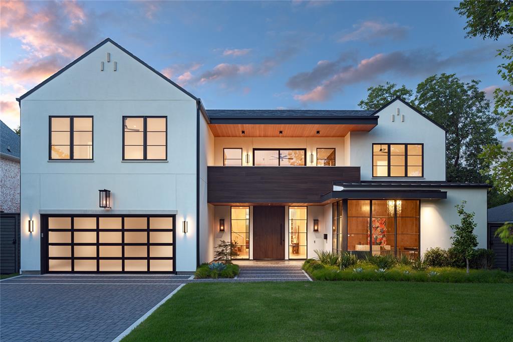 An architectural statement by S&R Development, this newly completed estate embodies the pinnacle of modern luxury on a quiet, tree-lined street in Preston Hollow. Spanning more than 6,700 square feet, the residence offers five bedrooms, five full baths, and two half baths, designed with both scale and intimacy in mind. Inside, soaring ceilings and walls of glass flood the home with natural light, while stone feature walls and a floating glass staircase create a sculptural focal point. Custom chandeliers and designer fixtures add a refined layer of artistry throughout. The chef’s kitchen, outfitted with Sub-Zero and Wolf appliances, flows into a dramatic great room crowned by 15-foot ceilings. A richly paneled study, expansive game room, and private gym enhance the home’s versatility. The first-floor primary suite is an indulgent retreat, complete with a spa-inspired bath and a remarkable floor-to-ceiling closet. Upstairs, four spacious en-suite bedrooms each offer walk-in closets, privacy, and comfort. Beyond the interiors, a resort-style pool with water feature, cabana, and beautifully landscaped grounds create an unmatched setting for entertaining. A rare three-car, climate-controlled garage completes this exceptional offering. Seamlessly blending bold architecture with bespoke detail, this Preston Hollow estate defines sophisticated living in one of Dallas’s most prestigious neighborhoods.