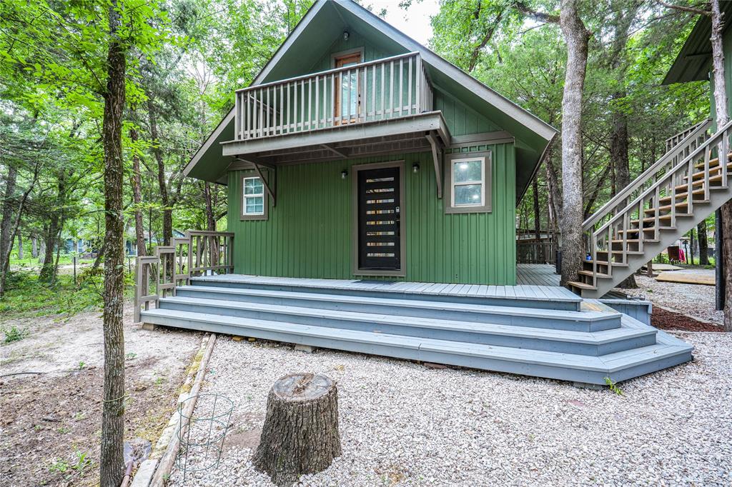 Nestled on 2 beautiful acres surrounded by nature trees, this charms home offers the perfect escape from the hustle and bustle of city life. Enjoy the peace, privacy, and natural beauty that this property provides while still being within a reasonable distance to nearby conveniences.
This unique home features a cozy yet functional layout with a welcoming front porch and a private balcony, ideal for relaxing and taking in the scenic views. The wooded surroundings create a serene atmosphere, perfect for those seeking tranquility, outdoor living or a weekend retreat.
Whether you are looking for a primary residence, a gateway home, or an investment opportunity, this property offers endless potential in a picturesque setting.
This beautiful property is just 15 min from Cedar Creek Lake.