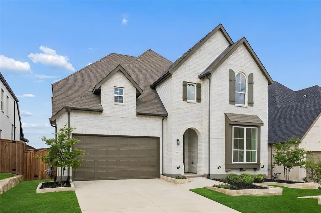 This east-facing, highly sought-after Highland Homes floorplan features an open-concept design throughout, with the primary suite, a secondary bedroom with its own full bath, and a media room all located downstairs, offering exceptional flexibility for guests, extended family, or a work-from-home setup. The downstairs secondary bedroom and full bath make hosting guests effortless, with no stairs to navigate and full privacy from the rest of the home. Upstairs, you'll find an oversized gameroom, three additional bedrooms, and three full bathrooms.
A wall of windows and soaring ceilings flood the main living areas with natural light, anchored by a two-story brick corner fireplace with a handsome wood mantle. Two ceiling fans in the living room keep air circulating throughout the open space, adding comfort year-round while helping ease the load on heating and cooling. The open layout creates an easy flow between the kitchen, dining, and living spaces, ideal for everything from quiet mornings to hosting a full house. Quartz countertops with under-cabinet lighting give the kitchen a clean, modern glow, while sightlines stretch from room to room, keeping the home feeling connected no matter where you are. Five bedrooms and 5.5 baths across 3,291 square feet give every member of the household room to spread out. The home is also pre-plumbed for a future whole-house water filtration system, a thoughtful touch for the next owner.
Located in the Sandbrock Ranch community in Argyle, residents gather at the Carriage House and enjoy a resort-style pool, splash pad, fitness room, stocked fishing lakes, walking trails, a dog park, and a lakeside patio, with regular community events on the event lawn.
Following a lightning-related fire, the home underwent extensive updates and improvements, including replacement of damaged sheetrock where needed, new HVAC system, new appliances, new roof, new interior paint, and new LVP flooring and carpet.