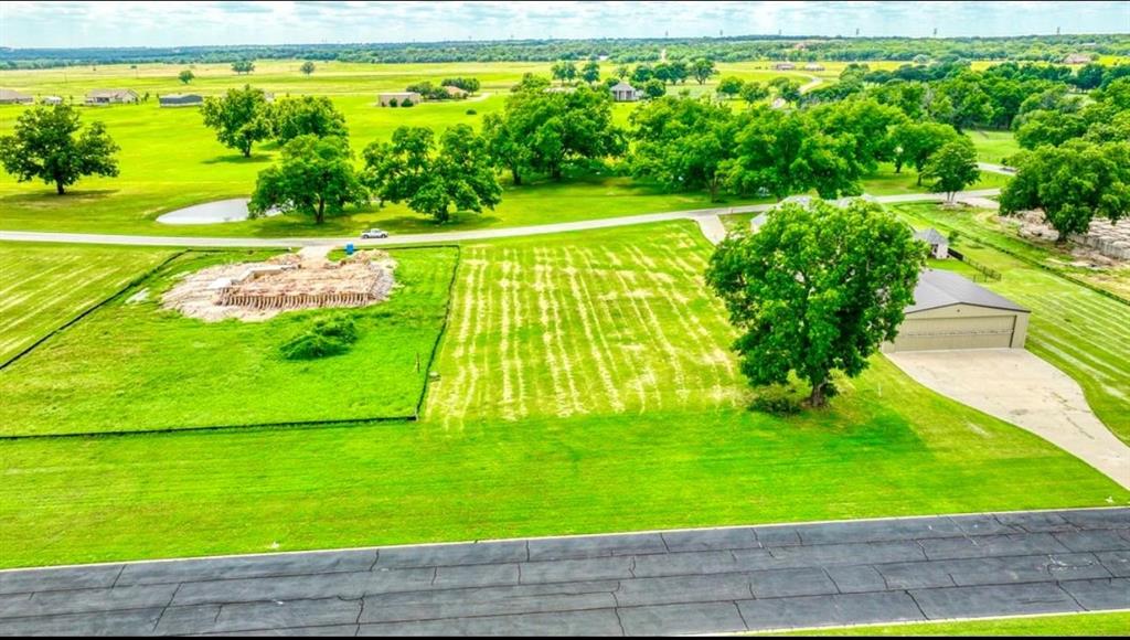 Experience luxury living with a country charm on this expansive 1.055 acre lot for sale in Driftwood Ranch on the Brazos. This gated, restricted airpark community provides unparalleled amenities, including a lighted, 2,906' paved runway, a private boat ramp and dock, and direct access to the Brazos River. Ideal for aviation and waterfront enthusiasts alike, this unique property also welcomes horses, creating the perfect blend of outdoor adventure and serene country living.
House-Hangar Lot