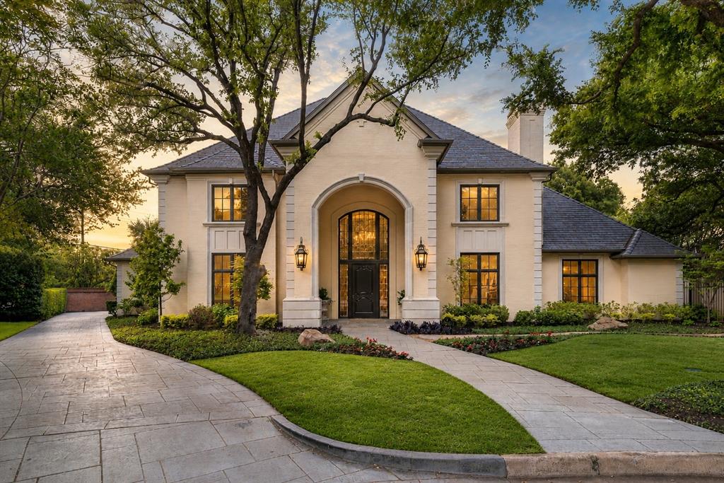 Nestled within the prestigious gated community of Los Arboles, 2 Manzano Circle is a thoughtfully updated estate set on a .62-AC cul-de-sac lot in the heart of Preston Hollow. Located inside this exclusive 24-hr guarded enclave, the home seamlessly blends timeless architecture, sophisticated design, + exceptional privacy. A refined exterior framed by manicured grounds, custom cast stone accents, + classic gas lanterns creates a memorable arrival experience. Inside, the home has been carefully enhanced with elevated finishes + purposeful design thru-out. Rich HW flooring, designer lighting + a newly installed gas range paired with a custom vent hood bring warmth + functionality to the main living spaces. The 1st-floor primary suite serves as a true sanctuary, generously sized + filled w natural light from expansive windows overlooking the lush backyard. The spa-like bath features a steam shower, freestanding soaking tub, dual vanities, a dedicated makeup vanity, + spacious walk-in and cedar closets. A secondary BR on the main level offers remarkable flexibility w custom built-ins, 2 walk-in closets + an updated en suite bath, making it ideal for guests, a private office, or additional living space. Upstairs, 2 oversized BRs each include beautifully renovated en suite baths, while a central landing area provides the perfect setting for a game room, lounge, or study space. An unfinished bonus room presents the opportunity to further tailor the home to your needs, while abundant storage can be found thru-out. Los Arboles, meaning The Trees was originally part of the historic Murchison estate + remains one of Dallas’ most serene + picturesque communities. Mature trees, tranquil ponds + elegant fountains create a peaceful, park-like environment just moments from premier private schools, luxury shopping + fine dining. Combining location, security + timeless refinement, 2 Manzano offers an exceptional opportunity in one of Preston Hollow’s most coveted neighborhoods.