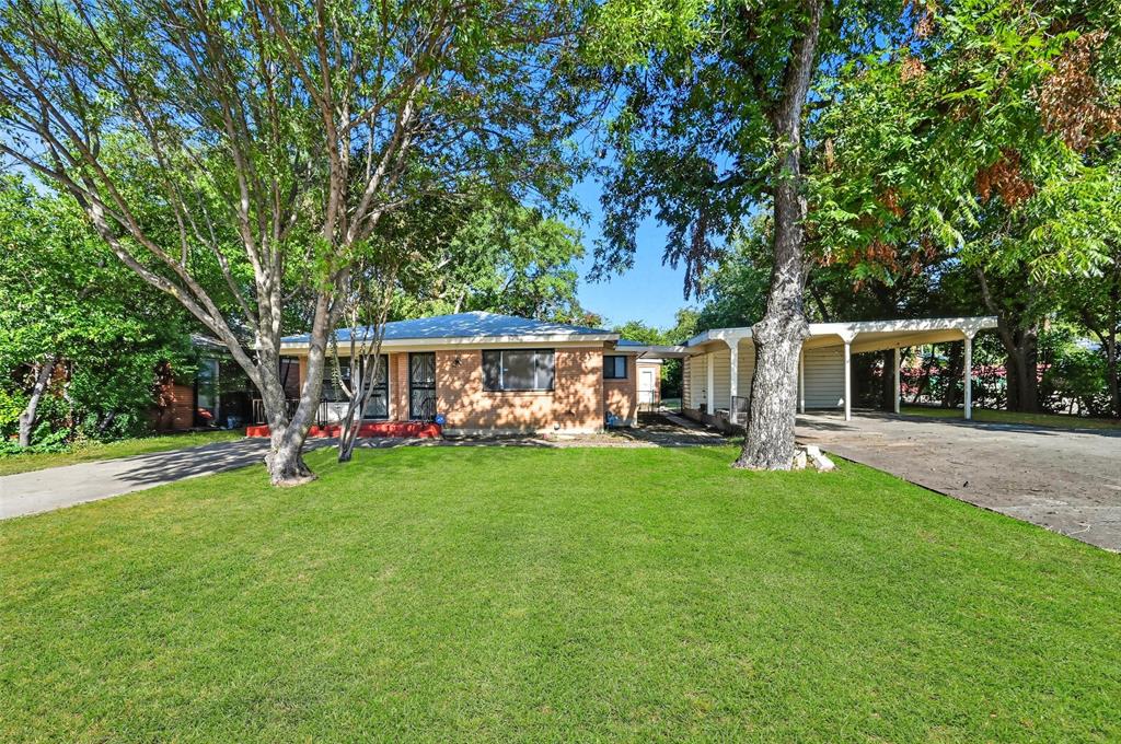Ideally located just off Bluebonnet Circle, this versatile home is perfect for students looking to share or for a family wanting convenient access to nearby schools. The home offers three spacious bedrooms and three full baths, providing comfort and privacy for everyone. Enjoy an eat-in kitchen, along with an additional efficiency kitchen in a separate room—ideal for roommates, extended family, or added convenience. A utility room with full-size washer and dryer adds everyday ease. One of the standout features is a large, light-filled room with skylights and a private entrance, perfect for a dance studio, home gym, artist’s studio, or creative workspace. With ample storage, generously sized rooms, and a fenced yard, this home offers both space and functionality. Parking is plentiful with a double carport plus a separate driveway, accommodating multiple vehicles. Come see the possibilities this unique home has to offer!