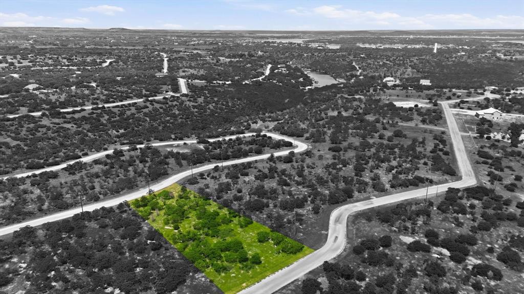 Come build your dream home in The Cliffs at Possum Kingdom and enjoy all the beauty and fun of Possum Kingdom Lake without the waterfront price tag. This residential lot gives you the perfect spot to create a place that truly feels like your own. With rolling hills, scattered trees, and peaceful surroundings, it’s easy to picture relaxing weekends and quiet evenings out here. You’ll still have access to all the great amenities The Cliffs is known for, including golf, pools, tennis, a marina, fitness center, and on-site dining. Whether you’re dreaming of a weekend getaway or a full-time home, this is a great opportunity to enjoy lake life, your way. Come take a look and start imagining the possibilities.