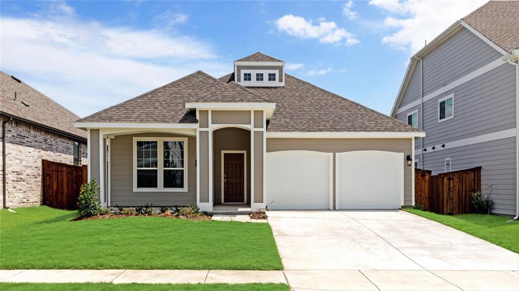 MLS# 20419949 - Built by HistoryMaker Homes - Ready Now! ~ Located in the highly sought after Master planned community of Waterscape. This home features a beautiful and unique exterior style including a large covered front porch plus a covered back porch. The open floor plan wastes no space. With modern interior design features such as Wood Plank Tile flooring in the entry, extended entry, kitchen, nook and family, 42 inch gray cabinets, granite countertops, modern herringbone tile backsplash, stainless steel gas appliances and garden tub with separate shower in the master bath suite. This home has classic character with all the efficiency and features of new construction!!