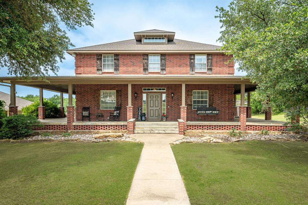 Tucked away on approximately 7.2 scenic acres just minutes from the heart of booming Celina, this stunning custom estate offers the perfect blend of luxury, privacy, and country living. Surrounded by mature trees with a picturesque pond and beautifully maintained grounds, this is a rare opportunity to own a private ranch-style retreat within Celina ISD. Featuring over 3,500 square feet, this two-story home offers 4 spacious bedrooms, 4 full bathrooms, and inviting living spaces designed for both everyday comfort and entertaining. The wraparound porch creates timeless curb appeal, while inside you’ll find a spacious layout, wood and tile flooring, granite countertops, a large kitchen island, and a cozy stone fireplace.  
Step outside to your own backyard paradise featuring a resort-style pool with waterfall, expansive outdoor living areas, outdoor kitchen, and breathtaking views of the surrounding acreage. The property is fully fenced and cross-fenced with a barn, workshop with electricity, RV parking, gated entrance, and ample space for horses, livestock, or recreational use. Whether you’re seeking a family homestead, equestrian property, or private escape from the city, this exceptional acreage offers endless possibilities while remaining conveniently close to Celina Downtown shopping, dining, and easy access to Celina ISD Schools. Experience the best of Texas country living without sacrificing modern conveniences. Ag exemption currently on the property.