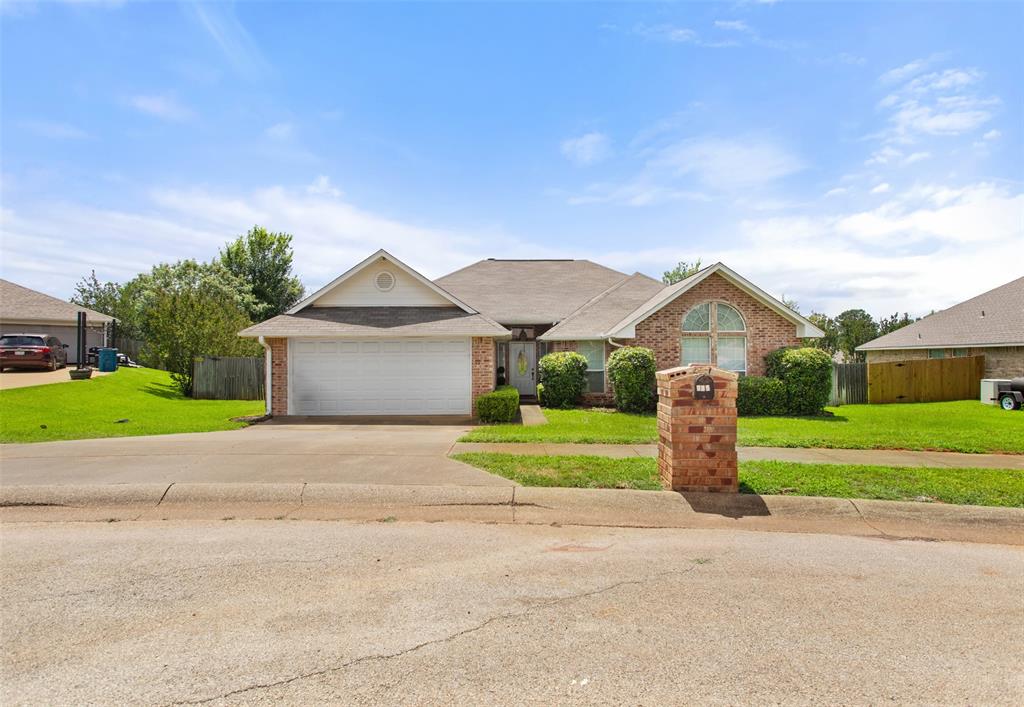 Need a 4th bedroom, home office, or flex space without sacrificing affordability? This versatile Jacksonville, TX home checks all the boxes without stretching your budget. This 4 bedroom, 2 bath home offers 1785 square feet of comfortable living on a spacious quarter acre lot just minutes from downtown Jacksonville. Built in 2002 and thoughtfully designed with a split floor plan, this home provides the privacy and flexibility today's buyers are searching for with no HOA and cul-de-sac neighborhood. The versatile fourth bedroom can easily serve as a home office, playroom, workout space, or guest room to fit your lifestyle. The open living area features a cozy fireplace, while the kitchen offers an island, ample workspace, and a convenient dining area perfect for everyday meals and gathering with family and friends. The primary bathroom has a double vanity, separate shower and tub, and two closets. Step outside to enjoy the large backyard and expansive patio space, ideal for weekend barbecues, entertaining, or simply relaxing outdoors. With room to grow, room to work from home, and room to make memories, this property is an excellent opportunity for first time buyers, growing families, or anyone looking for a home that adapts to their needs. Conveniently located approximately 8 minutes south of downtown Jacksonville, your new home delivers the space, flexibility, and value you've been looking for with no HOA.