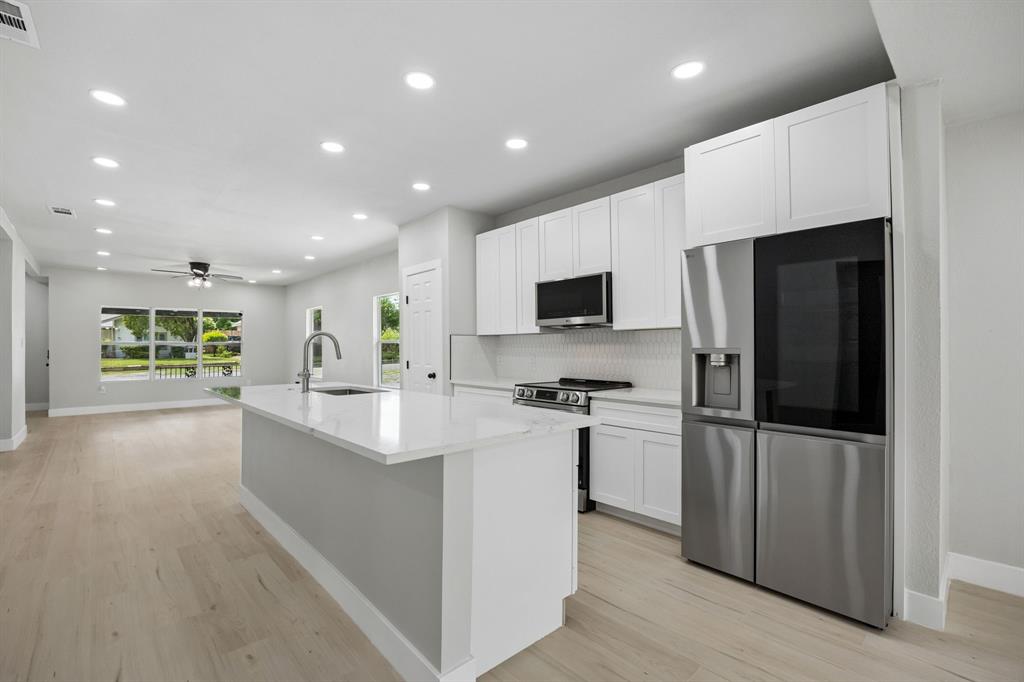 Welcome to 312 Leads St. This fully renovated home combines modern aesthetics and new systems with the charm of an established home just minutes outside of Downtown Dallas, Bishop Arts and more. Full renovation not only includes the cosmetic but just as important new HVAC, plumbing, electrical, windows, foundation and roof. Open floorplan gives flexibility of use, perfect for entertaining while maintaining the warmth for everyday living. Kitchen boasts new top of the line appliances, quartz countertops, large island and soft close cabinets. Primary is good sized with ensuite bath that includes lighted vanity, soaking tub and walk in shower. Three additional bedrooms are separated from primary and share two bathrooms with similar updates. Deck off the dining area leads to the generously sized backyard. Not only do you have all the dining and shopping options with easy access to Downtown, Uptown, Bishop Arts and Trinity Groves but also just around the corner from the new Halperin Park. Similar in nature to Kylde Warren, the new “bridge park” includes a large green space, playground, interactive water feature, food truck area and more making it a perfect place to enjoy the outdoors. 312 Leads St. is ready for its new owner to enjoy not only a great home life but also a great lifestyle to match.
