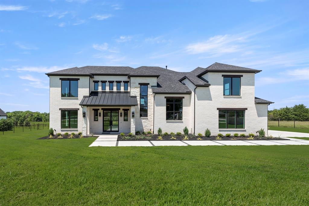 MLS# 21267685 - Built by Oak Creek Custom Homes - Ready Now! ~ This stunning 5 bedroom, 5.5 bath single-family home in peaceful Le Ruissseau boasts an expansive 4,986 square feet of modern living space. The layout grand great room with cathedral ceiling with wood beams and an oversized fireplace. The home has nailed down white oak hardwood floors. The great room opens into kitchen with a chef's dream appliances and abundant custom cabinetry throughout. Sliding glass doors lead to an outdoor patio with built-in fireplace and views of massive backyard that is ready for the pool and backyard oasis of your dreams. The cozy study halfway up the stairs is a unique feature with wood beams and custom cabinetry. The home features the primary bedroom and the convenience of one guest bedroom downstairs with its own on suite. The three additional bedrooms upstairs each have their own attached bathroom as well as a large game room and media room and plenty of storage. With two living areas and a dedicated dining area, this home is designed for both relaxation and entertaining.  Don't miss the opportunity to make this exceptional home your own!