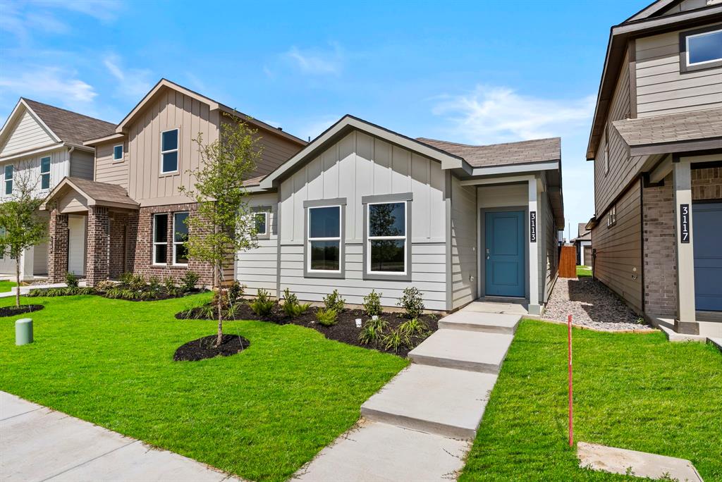 *5% lender incentive offered with the use of the seller’s in-house lender, Homeward Mortgage! Incentive may be used towards buyer closing costs and or rate buy-down, subject to lender approval and buyer qualification.
The Acorn is a smartly designed single-story home offering approximately 1,300 sq. ft. of living space with 3 bedrooms, 2 bathrooms, and a 2-car garage. A welcoming front porch opens into the entryway and leads into an open-concept main living area where the kitchen, dining space, and family room connect in one bright, comfortable layout, perfect for everyday living and easy entertaining. The kitchen features stainless steel appliances, ample counter space, and a center island with a sink overlooking the family room, plus convenient pantry storage. The adjacent dining area flows seamlessly into the family room, creating an inviting space to gather. The private primary suite is thoughtfully separated from the secondary bedrooms and includes a spacious bedroom, walk-in closet, and an ensuite bath. Two additional bedrooms are located on the opposite side of the home, each with its own closet and convenient access to the secondary bathroom. A dedicated laundry area and direct access to the two-car garage add everyday convenience. At the rear of the home, the patio extends your living space outdoors for relaxing or entertaining. With its open living design and well-planned bedroom separation, the Acorn offers comfort, functionality, and flexibility for a variety of lifestyles.
