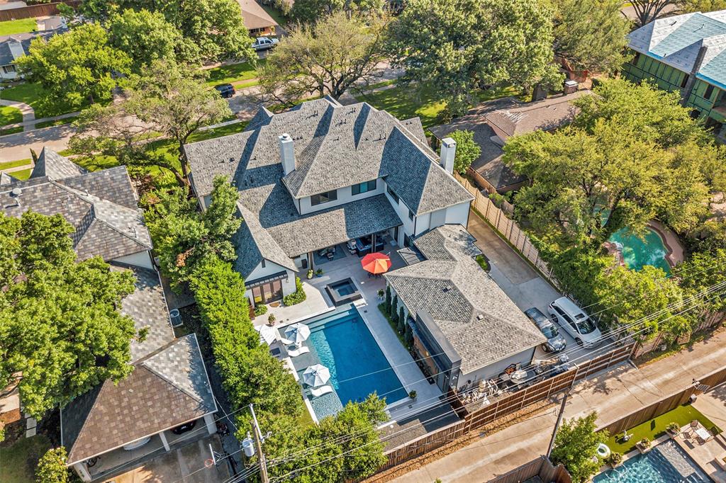 It’s your own private resort located on .4 acres that’s walking distance to Boone Elementary in award-winning Highland Park ISD! Completed in 2018 with every detail beautifully executed, the 7501 SF will wow you. There’s a perfect blend of light, bright and open yet warm, cozy, and welcoming. Every amenity has been thoughtfully created: a master suite you won’t want to leave, a gym that might make you want to work out, a killer pool, outdoor living, phantom-screened back porch, elevator, 3-car garage, and a kitchen-living area with two fireplaces that’s the heart of it all!  Come see it and try not to say, 'Wow!'