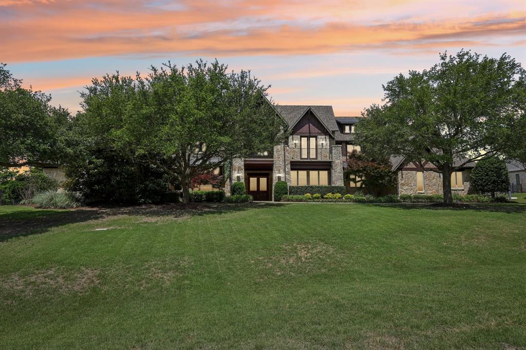 This extraordinary 5-bedroom, 5.1-bathroom custom home by renowned builder Tim Jackson is truly one of a kind. Located in the Lovejoy ISD.
Featured in an architectural magazine and situated on the premier lot in the neighborhood, this estate is a rare find. Located on a private corner lot with a stunning water feature in front and tranquil water views in back, the resort-style pool with water views creates a picture-perfect backdrop for entertaining or relaxing. Inside, the recently remodeled chef’s kitchen is a showstopper—featuring granite with leather-finished countertops, high-end appliances Themador, and thoughtful design tailored for both everyday living and entertaining
Every detail of this home has been thoughtfully designed for timeless elegance and modern luxury. Don't miss the opportunity to own a masterpiece.
Mother in law suite or au pair suite located on the first floor.