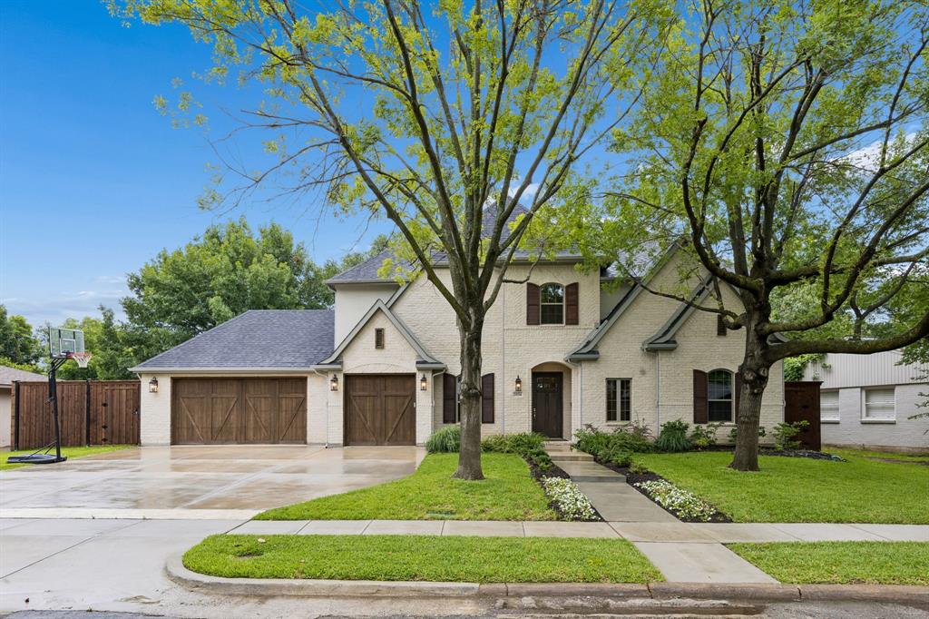 Discover this stunning home featuring a craft room, dedicated study, versatile flex-room can be used for first floor media room, second office or playroom, spacious three-car garage with pull-though featuring cedar-clad garage doors on opposite sides of the same bay allowing backyard access,  Perfectly blending elegance, comfort, and family functionality, this beautifully designed home offers exceptional living in highly sought-after Sparkman Club.
From the dramatic rotunda-style entrance hall with sweeping staircase, arched openings, and elegant curves to the vaulted ceiling and expansive windows that flood the home with natural light, every detail makes a lasting impression.
The open-concept living area is perfect for entertaining and everyday living, featuring a spacious family room with fireplace, chef’s kitchen, generous dining room, butler’s pantry, walk-in pantry, oversized island, and seamless access to the covered outdoor living area. The chef’s sanctuary is beautifully appointed with quartz countertops, a professional-grade kitchen setup, and a NEW 48-inch built-in refrigerator.
The luxurious primary suite offers a true retreat with a spa-inspired bath featuring a freestanding soaking tub and an oversized walk-in closet. A private guest bedroom is also conveniently located on the main floor.
Upstairs, you’ll find three additional bedrooms, each with spacious walk-in closets, along with a large game room and media room.
Outside, enjoy a pool-sized backyard, covered patio, and an oversized 3-car garage with an additional pull-through rear garage door providing easy backyard access.
Additional features include installed security cameras, full sprinkler system, and dual tankless water heaters.
Located in the desirable Sparkman Club neighborhood, buyers have the option to join the club featuring swimming and tennis amenities. Membership is voluntary.
