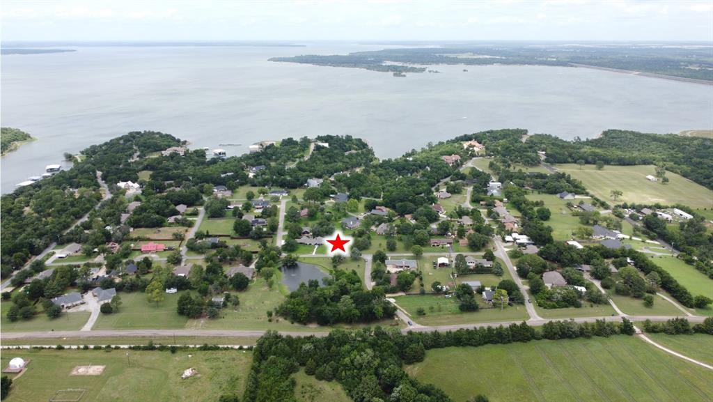 This 0.39-acre lot in Thomson Heights, Denison, Texas, offers an excellent opportunity to build your custom home in an established residential neighborhood. With water service available and ample space for a variety of home designs, this buildable site combines convenience with access to outdoor recreation. The property is ideally situated just 0.5 miles from Eisenhower State Park, where residents can enjoy hiking, camping, fishing, and scenic views of Lake Texoma. Boating enthusiasts will appreciate being only 1.2 miles from the Denison Dam Boat Ramp, providing quick access to the lake for fishing and water sports. Whether you're looking to build a primary residence, vacation retreat, or investment property, this well-located lot offers the perfect blend of neighborhood living and recreational access.