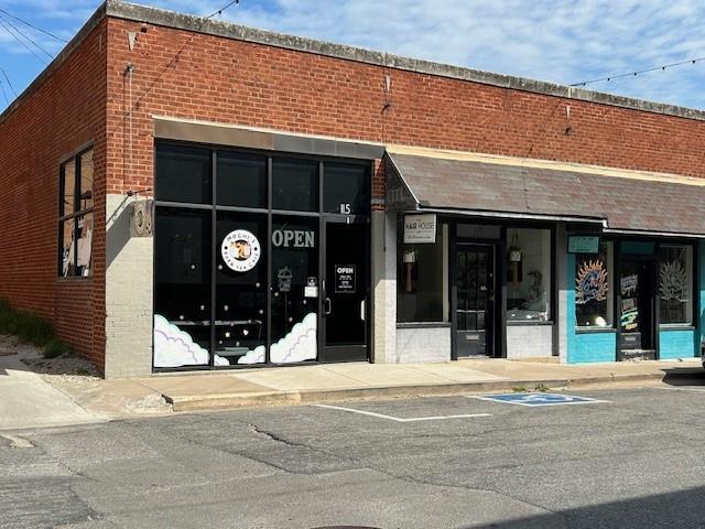 FOUR Rental Spaces for Sale on the coolest street in Downtown Sherman, WALL STREET. Buy one or buy all four.  Prices range from $149,000 for the end unit and the other interior units are $139,000 each.  Just a half block off Travis Street and in the same complex as Lupe's Famous Tamales.  Be part of the tremendous growth coming to Grayson County, with over 60 billion being invested in the Sherman Tech Center.
City of Sherman offers Downtown Building Improvement Grants including grease traps and help with fire suppression systems.  See information attached in Supplements about the Incentive programs offered by the City of Sherman.