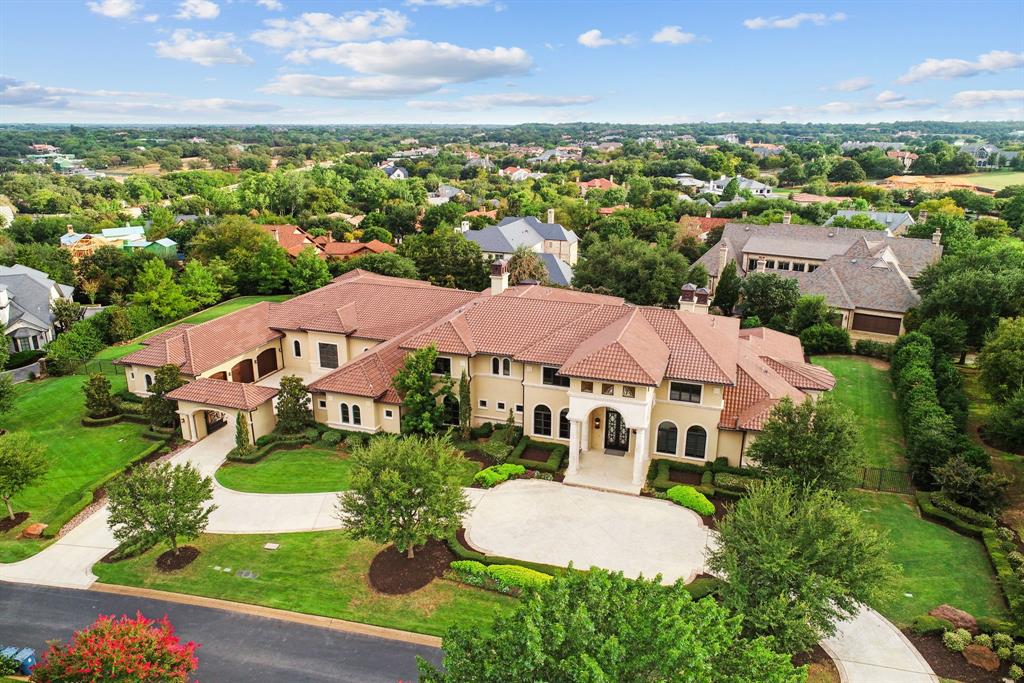 This home has 14,000 square feet of luxurious living space, you can expect nothing but the best. The property boasts a range of top-of-the-line amenities that are sure to impress even the most discerning of homeowners! It is truly a dream come true for anyone who loves to have fun and stay active. With amazing amenities such as a bowling alley, half-court basketball court, gym, and even a hair salon, you'll never run out of things to do. Imagine bowling with friends on a rainy day, shooting hoops with your kids, or taking a dip in your sparkling pool! You'll love spending time outside, soaking up the sun, and enjoying the beautiful surroundings. There's also plenty of outdoor living space, where you can relax and unwind with family and friends. So why settle for a boring, ordinary home when you can have a one-of-a-kind home? With close proximity to DFW Airport, Shopping, dining, and more, your adventures are endless! Come see this amazing property today and start living your best life!