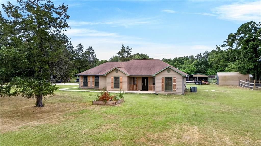 This charming 3 bedroom, 2 bath home, built in 2016, offers the perfect blend of peaceful country living with the convenience of nearby city amenities. Homesteaders will love the thoughtfully designed property featuring a pasture ideal for small animals such as goats, poultry pens, and an established raised-bed garden ready for filling those canning jars. Braces and corners are already in place, making it easy to fence the front acre for a horse, cow, or additional livestock. The large shop provides plenty of space for two vehicles or can easily serve as a workshop for hobbies, projects, or equipment storage. Inside, the home has been freshly repainted from ceiling to floor and features brand new laminate flooring throughout. The bathrooms offer ceramic tile floors and tasteful updates for a clean, modern feel. This home is ready for its next small farmer, hobby homesteader, or family looking to enjoy a little extra space and country charm.