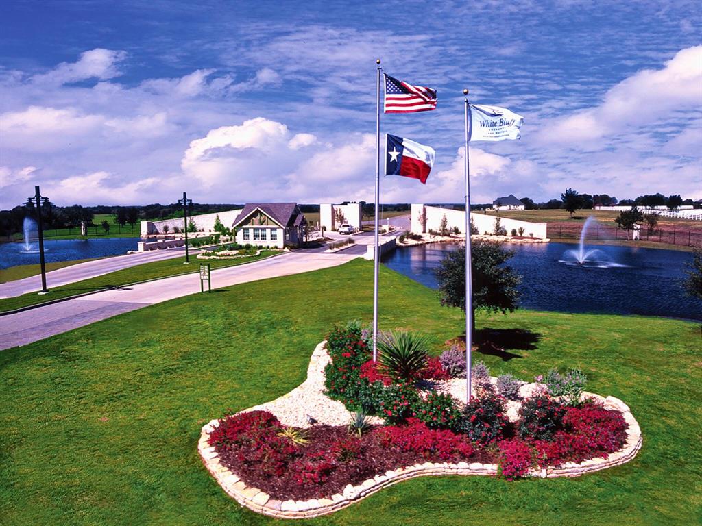 White Bluff Resort is a premier gated community spanning more than 3,000 scenic acres in the Texas Hill Country, offering private access to Lake Whitney. Residents enjoy resort-style amenities including two championship golf courses, pro shop, dining options, marina, chapel, walking trails, swimming pools, tennis courts, and more. With over four miles of Lake Whitney shoreline, White Bluff features beautiful custom homes, residential lots, and an exceptional lifestyle for full-time living or weekend getaways.