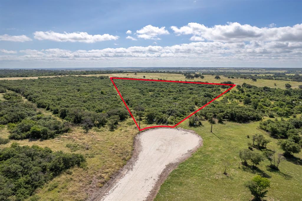 Located within the gated Indian Springs Property Owners Association community, the property features power and fiber internet available at the entrance, while a well and septic system would be needed for development. Neighboring properties have successfully perc tested, and nearby wells reportedly reached water around 500 to 600 feet deep. The HOA is considered very reasonable, with annual dues of approximately $250 helping maintain roads, the gated entrance, and community standards, while light restrictions are primarily intended to protect long term property values. Seller financing is available!