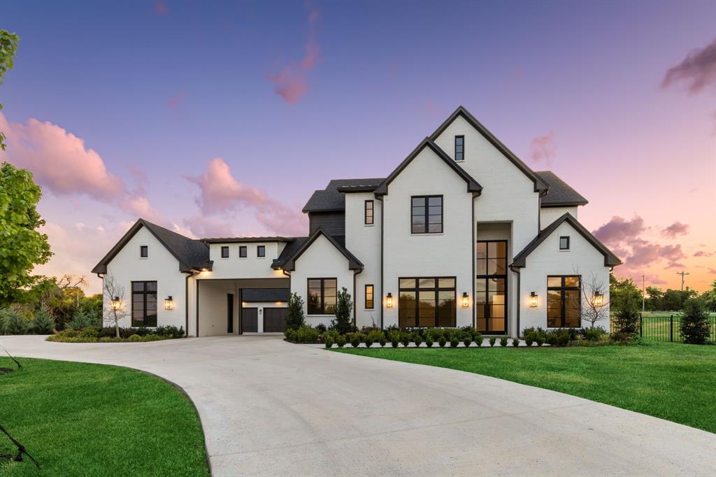 Quality craftsmanship meets stunning design! Tucked in prestigious Lovejoy ISD, this home sits on 2 acres with a 100 year old pecan tree. Kitchen is central with views of back yard and car court and boasts soft-close cabinetry, top tier appliances, coffee bar, working pantry with sink and second fridge. Main living opens to spacious covered patio. First-floor primary and guest beds each have marble ensuite and custom closet, with a gorgeous tub and storm shelter in the primary. Spacious study and game room downstairs, with additional game room up. Second level boasts fully insulated media room, flex room, and 3 bedrooms with full baths and custom closets. Drop zone organizes entry from 3-car garage while detached single accommodates a car lift and climate control system. Front landscaping welcomes guests and the back and side yards are a blank canvas for your perfect outdoor oasis. Just minutes from 75-121, this gorgeous property offers an easy commute yet feels like it’s miles away.