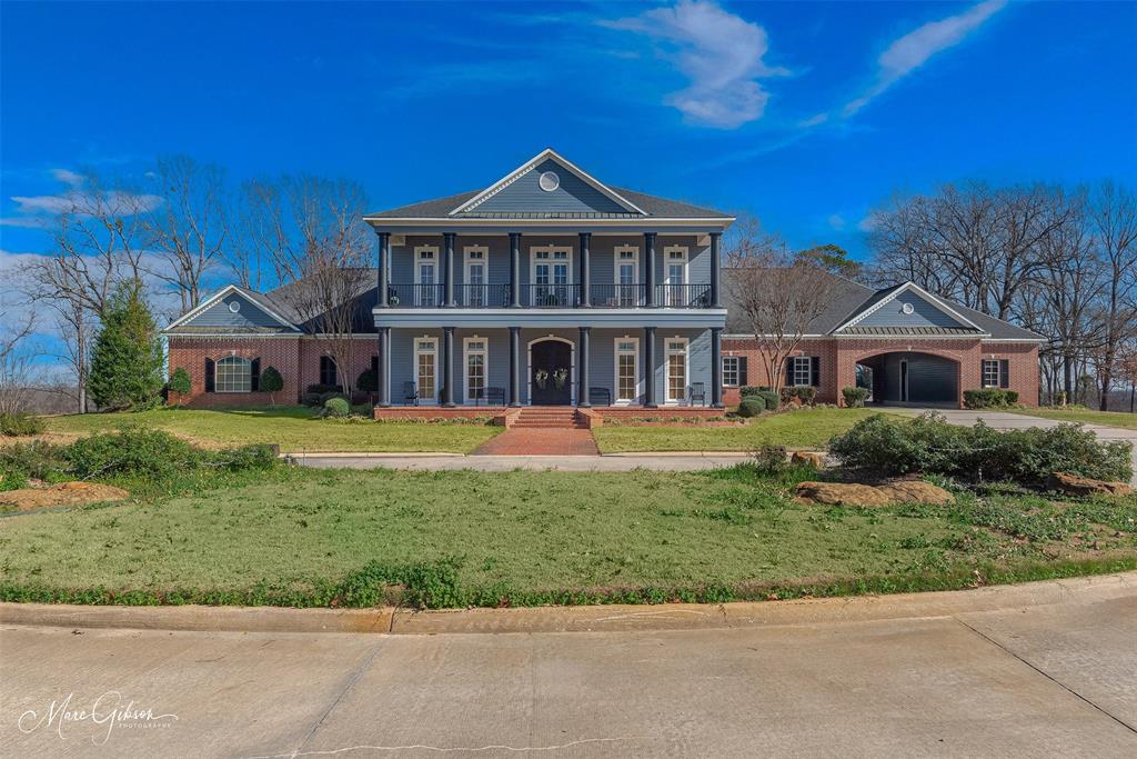 This grand colonial estate on nearly 24 acres is the perfect fusion of elegance and modern comfort. With 6 spacious bedrooms and living spaces that include fireplaces and ensuite luxury, it offers an atmosphere of refined relaxation. Step outside to a newly added heated pool, perfect for year-round enjoyment. One of the barns has been beautifully remodeled into a modern studio apartment—ideal for guests or a creative retreat. With brand-new AC and a state-of-the-art security system, every detail supports a lifestyle of luxury, all just a short drive from the city