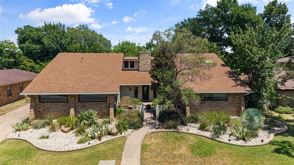 Welcome to 2211 Southcrest Dr, where breathtaking greenbelt views, timeless character, and spacious living come together in one of Arlington’s most desirable settings. Backing directly to Rush Creek Linear Park – North, this beautifully maintained 3-bedroom, 2.5-bath home offers exceptional privacy, scenic views, and a truly one-of-a-kind backyard setting. Step inside to soaring vaulted ceilings, abundant natural light, and a spacious living room anchored by a dramatic floor-to-ceiling stone fireplace. The adjoining sunroom showcases beautiful views of the greenbelt, creating the perfect space for a home office, reading room, or peaceful retreat. The updated kitchen features stainless steel appliances, generous counter space, abundant cabinetry, and a walk-in pantry, making it ideal for everyday living and entertaining. The flexible floor plan offers three spacious bedrooms and two and a half bathrooms, providing comfort and privacy throughout. Step outside to your private backyard oasis, where the expansive deck overlooks the lush greenbelt and Rush Creek Linear Park – North. Whether enjoying your morning coffee, entertaining friends, or unwinding at sunset, you’ll appreciate the peaceful natural backdrop and the privacy of having no immediate rear neighbors. This exceptional outdoor setting offers a tranquil escape while remaining close to everything Arlington has to offer. Additional features include a 2-car attached garage and an excellent location near shopping, dining, parks, entertainment, and major commuting routes. Combining thoughtful updates, versatile living spaces, and an incredible park-side setting, 2211 Southcrest Dr offers a rare opportunity to enjoy both privacy and convenience in the heart of Arlington. Schedule your private showing today!