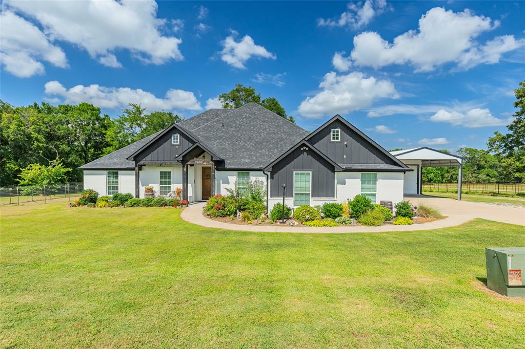 Welcome home to this stunning custom-built modern farmhouse on .87 acres just outside the city limits, offering peaceful country living with the convenience of being close to town. One of the few homes in the subdivision with no HOA—you'll enjoy added freedom and flexibility. Located in the highly sought-after Lone Oak ISD, this property offers the perfect blend of space, style, and location. This 4-bedroom, 2.5-bath, 3-car garage home with a dedicated office features an open-concept layout perfect for entertaining and everyday living. The spacious kitchen is the heart of the home, showcasing a large island, quartz countertops, ample cabinetry, a walk-in pantry and full size utility room. The primary suite offers a relaxing retreat with an en-suite bath featuring a double vanity with quartz countertops and a spa-like wet-area featuring an oversized walk-in tile shower and garden tub. Stylish finishes, abundant natural light, and modern charm can be found throughout the home. Outside, enjoy nearly an acre of space and a 20x30 spray foam insulated shop with electricity, a 9x30 lean-to, a 20x20 covered carport area with double bay doors—ideal for storage, hobbies, or a workshop. Stay warm during the cold season with two wood burning fireplaces, one in the living room and one outside on the back patio. From the moment you arrive, you'll appreciate the quality craftsmanship, thoughtful design, and welcoming atmosphere that make this house feel like home. Don't miss this rare opportunity to own a beautiful home that combines comfort, functionality, and freedom in one of the area's most desirable school districts.  Schedule your showing today and experience everything this exceptional property has to offer in person—you won't want to leave!