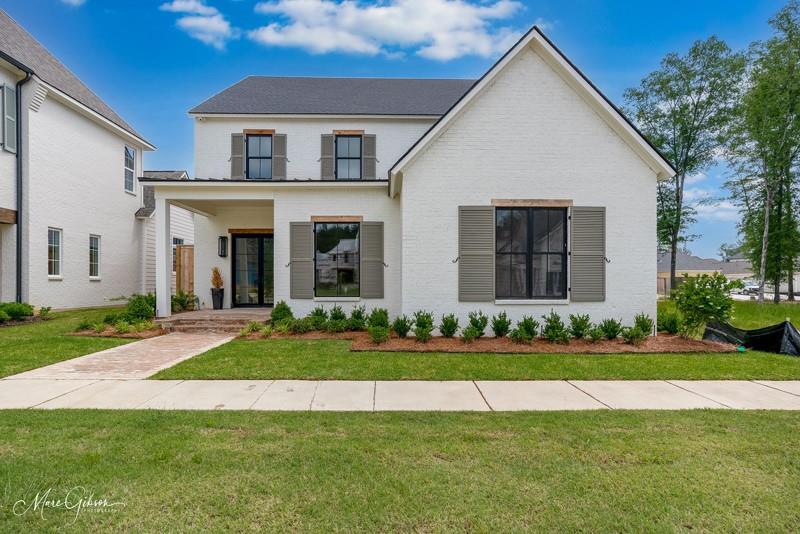 Move-in-ready new construction home in prime Provenance Neighborhood location.

Built to capture the views of the scenic park, this exquisite home is a true showpiece. Step through elegant glass doors into a beautifully designed open floor plan featuring a sophisticated living area with a fireplace and custom built-ins. The dining space offers serene park views, creating the perfect ambiance for every meal.

The chef’s kitchen is a masterpiece, boasting GE Monogram appliances, a paneled dishwasher, refrigerator, freezer, and bar fridge that seamlessly blend with sleek European cabinetry. A butler’s pantry provides ample storage for snacks, linens, and more, while the stylish bar area features a hammered sink and additional refrigeration for effortless entertaining.

A secondary bedroom and bath at the front of the home enjoy abundant natural light and picturesque park views. The luxurious primary suite is a private retreat, complete with a spa-inspired bathroom featuring a spacious shower, built-in hamper drawers, and a soaking tub. The walk-in closet is a dream, offering dedicated spaces for shoes—from sandals to boots—and pull-down rods for seasonal organization.

Upstairs, two additional bedrooms accompany a sprawling den, playroom, plus a versatile flex space perfect for an office, gym, craft room, or even a ballet studio. Outside, the side porch is a private oasis with garden beds and lush turf, ideal for relaxation.

This home must be seen to be fully appreciated—schedule your visit today!