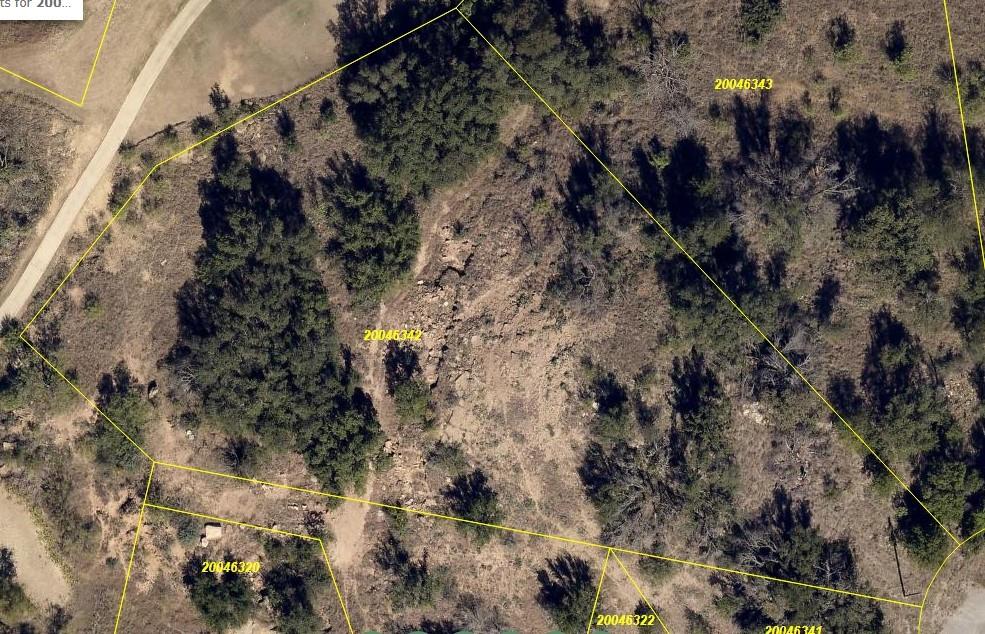 Beautiful large 1 acre golf course lot overlooking the second green and the third t-way box. Just waiting for a new owner to build a dream home.