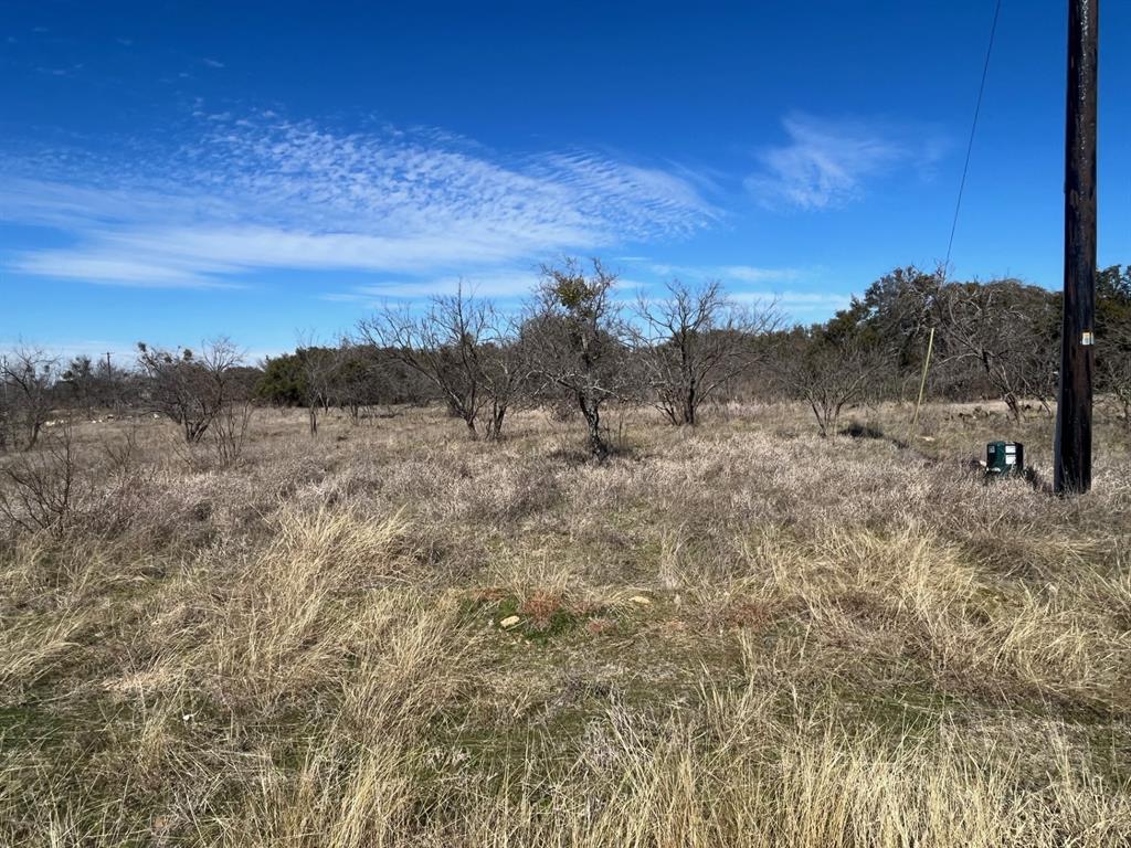 Great Residential lot at the Best Golf Course in Central Tx! This .34-acre lot faces the 14th hole fairway and is located in a perfect spot to build that new custom home you have been dreaming about. Provided as part of the package landowners are allowed 4 rounds of golf each month that accrue each month if not used. One free week of cabin or room rentals along with use of the clubhouse and pool. There are also several stocked fishing tanks located about the resort as well. Water, electricity and sewer are available to the lot. This great lot at this Fantastic Resort has a lot to offer so get your house plans ordered and your builder picked out and make an offer today.