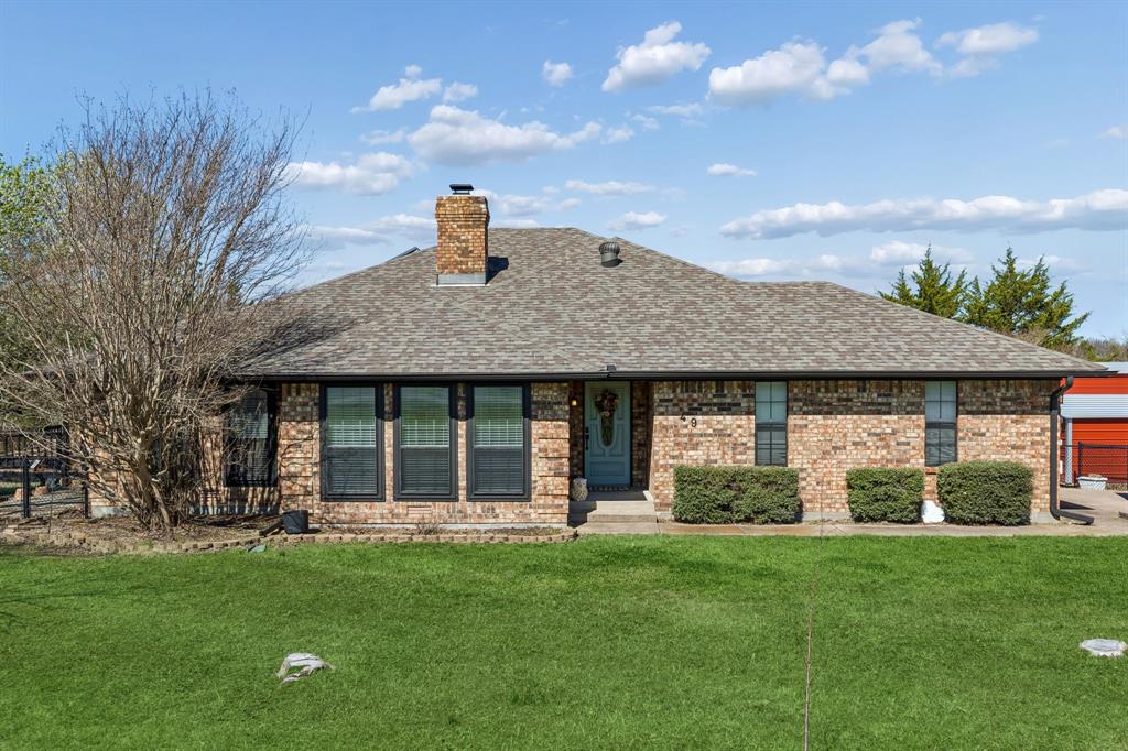 Welcome to your private retreat where space, style, and lifestyle come together on just under 2 beautiful acres. This thoughtfully renovated single-story home offers 1,893 square feet of comfortable living space, featuring three bedrooms, two bathrooms, and an outdoor setting designed for both relaxation and entertaining. With nearby access to a lake and a park with a playground, this property blends peaceful country living with recreational convenience—creating a place where everyday life feels like a getaway. From the moment you arrive at your country oasis, the expansive two-acre homesite sets the tone. Mature trees, open skies, and wide-open space provide a sense of privacy that is increasingly rare. Whether you're looking for room to garden, space for pets to roam, or simply the ability to enjoy quiet evenings under the stars, this property delivers the freedom and flexibility that acreage living provides. the outdoor living spaces truly set this property apart. Step outside onto the expansive deck where the highlight feature awaits—a swim spa combination built directly into the deck design. This incredible feature offers the best of both worlds: a relaxing spa experience and the ability to swim or exercise in place. Whether you want to start your morning with a swim, unwind after a long day in the soothing spa jets, or host a fun gathering with friends, the swim spa becomes the centerpiece of the outdoor lifestyle this home provides.